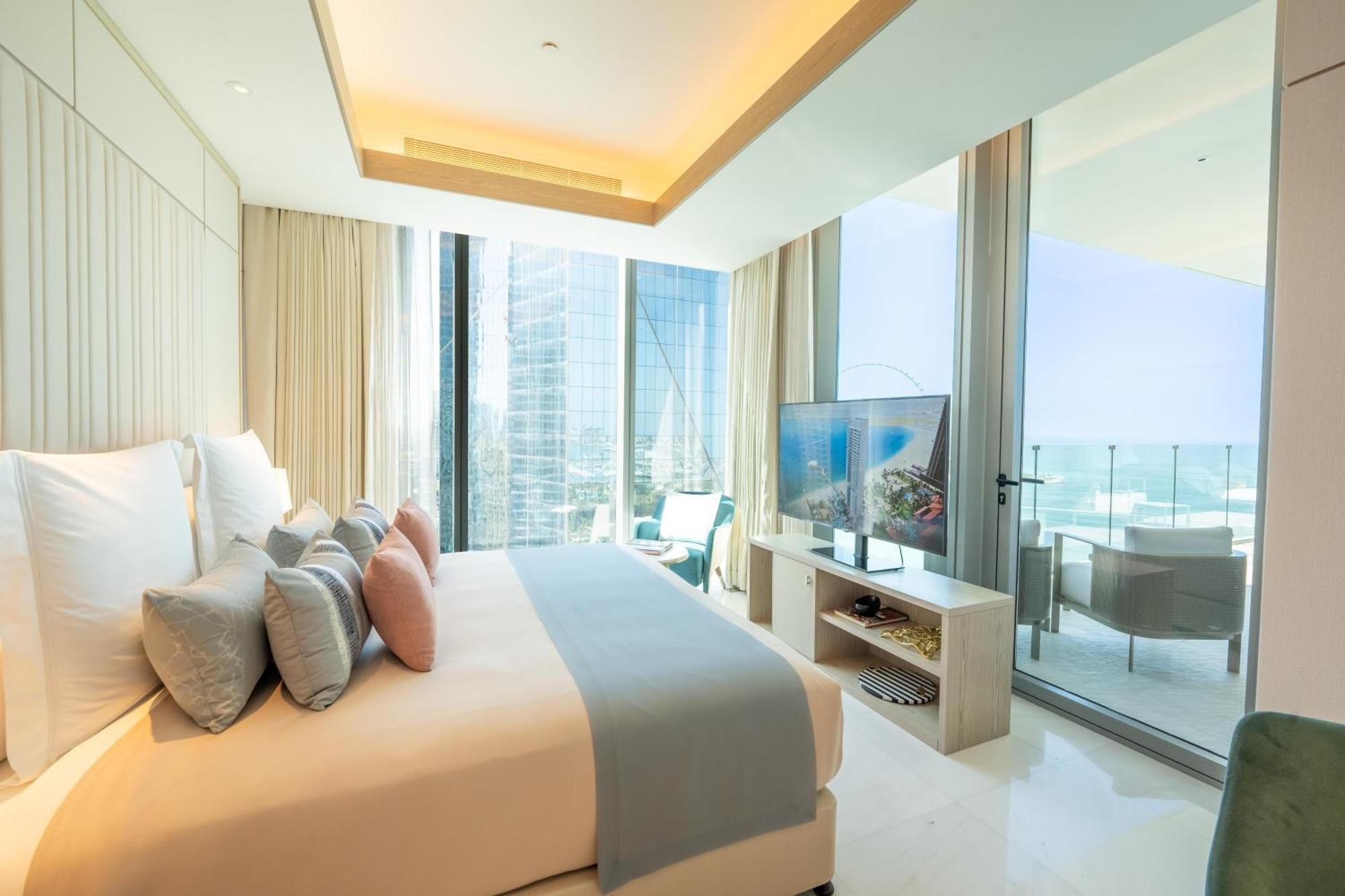 Five Luxe Dubai Exterior foto A bedroom at the Ritz-Carlton, Maldives